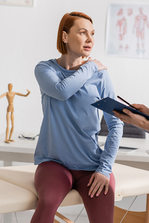 patient consulting with a doctor of acupuncture